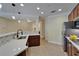 Bright kitchen featuring stainless steel appliances and a breakfast bar at 6451 Sunset Bay Cir, Apollo Beach, FL 33572