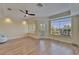 Bright living room features modern finishes, tray ceiling, and large windows for natural light at 6451 Sunset Bay Cir, Apollo Beach, FL 33572
