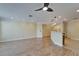 Spacious living area featuring hardwood floors, modern lighting and an open design at 6451 Sunset Bay Cir, Apollo Beach, FL 33572