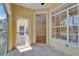 Inviting patio with tiled flooring and scenic neighborhood views through screened windows at 6451 Sunset Bay Cir, Apollo Beach, FL 33572