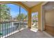 Outdoor patio showcasing serene water views and lush landscaping at 6451 Sunset Bay Cir, Apollo Beach, FL 33572
