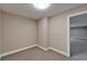 Small room with neutral carpet offers flexible space for storage or an office at 6451 Sunset Bay Cir, Apollo Beach, FL 33572