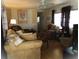 Cozy living room features plush seating, soft lighting, and a tranquil ambiance perfect for relaxation and gathering at 652 54Th S Ln # 153, Gulfport, FL 33707