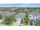Neighborhood aerial view with lush greenery, highlighting the property's well-kept landscaping at 7338 Milestone Dr, Apollo Beach, FL 33572