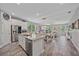 Spacious kitchen island view showcasing granite countertops and an open floor plan at 7338 Milestone Dr, Apollo Beach, FL 33572
