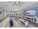Open floor plan showcasing modern living room that flows into the kitchen and dining area at 7338 Milestone Dr, Apollo Beach, FL 33572
