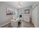 Home office with a modern desk, ample natural light, and a calming atmosphere at 7338 Milestone Dr, Apollo Beach, FL 33572