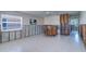 Open living space with tile floors and a stylish bar area at 763 182Nd E Ave, Redington Shores, FL 33708