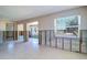 Open floor plan with large windows offering natural light, ready to be transformed into a cozy living space at 763 182Nd E Ave, Redington Shores, FL 33708