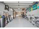 Large and organized garage space that can also be used for storage, featuring a door leading to the home's interior at 8244 Brentwood Rd, Seminole, FL 33777