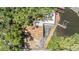 An aerial view of a home with a dock leading to the water at 8816 Memorial Hwy, Tampa, FL 33615