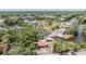 A waterfront home and neighborhood are seen in this aerial view at 8816 Memorial Hwy, Tampa, FL 33615
