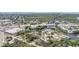 Stunning aerial view of a coastal community with waterways and shopping nearby at 8816 Memorial Hwy, Tampa, FL 33615