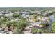 Aerial view showcases a residential neighborhood nestled along winding waterways at 8816 Memorial Hwy, Tampa, FL 33615