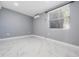 Bright bedroom with marble floors and modern mini split at 8816 Memorial Hwy, Tampa, FL 33615