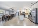 Open-concept layout showcasing kitchen with dining area and living space at 8816 Memorial Hwy, Tampa, FL 33615