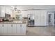 Spacious kitchen with stainless steel appliances, granite countertops, and ample storage space at 8816 Memorial Hwy, Tampa, FL 33615