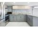 Kitchen featuring stone countertops and stainless appliances at 8816 Memorial Hwy, Tampa, FL 33615
