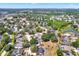 Extensive aerial view of a residential neighborhood with lake views at 9603 Sunnyoak Dr, Riverview, FL 33569