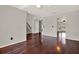 Spacious living room with hardwood floors and staircase with neutral paint and ceiling fan at 9603 Sunnyoak Dr, Riverview, FL 33569