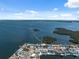 Stunning aerial view capturing the waterfront properties, clear waterways, and lush foliage at 9920 Spoonbill E Rd, Bradenton, FL 34209