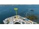Aerial view showcasing waterfront property, ideally located on canal with easy access to bay at 9920 Spoonbill E Rd, Bradenton, FL 34209