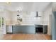 Updated kitchen with stainless steel appliances and sleek cabinets at 108 5Th St, Belleair Beach, FL 33786