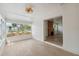 Bright sunroom featuring hardwood floors and lots of windows for natural light at 108 5Th St, Belleair Beach, FL 33786