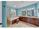 Bright bathroom featuring double vanity with granite countertop, soaking tub, and glass-enclosed shower at 108 Bermuda Ave, Tampa, FL 33606