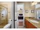 Stylish bathroom features a shower, granite countertops, and a doorway to the bedroom at 108 Bermuda Ave, Tampa, FL 33606