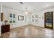 Bright foyer with tile flooring, chandelier, windows, and a decorative front door at 108 Bermuda Ave, Tampa, FL 33606
