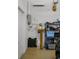 Organized garage space with shelving units, water heater, and storage, maximizing utility at 108 Bermuda Ave, Tampa, FL 33606