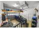 Spacious garage with overhead storage and room for a vehicle, with lots of storage at 108 Bermuda Ave, Tampa, FL 33606