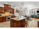Spacious kitchen featuring granite countertops, stainless steel appliances, and custom cabinetry at 108 Bermuda Ave, Tampa, FL 33606