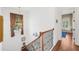 Staircase with iron railing and hardwood floors at 108 Bermuda Ave, Tampa, FL 33606