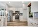 Well-equipped kitchen with stainless steel appliances, sleek cabinets, and a functional layout at 10922 Holly Cone Dr, Riverview, FL 33569