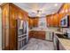 Spacious kitchen with stainless steel appliances, granite countertops, and ample cabinet space at 11035 Huron Rd, St Petersburg, FL 33708