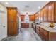 Spacious kitchen with stainless steel appliances, granite countertops, and ample cabinet space at 11035 Huron Rd, St Petersburg, FL 33708