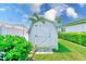Backyard storage shed with a charming design and ample space for gardening tools and equipment at 11035 Huron Rd, St Petersburg, FL 33708