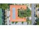 Aerial view of townhouses with tile roofs and mature landscaping at 111 S Delaware Ave # 1, Tampa, FL 33606