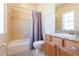 Bathroom with tile and shower with a gray curtain at 111 S Delaware Ave # 1, Tampa, FL 33606
