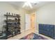 Cozy bedroom with a shelving unit, a blue dresser, and natural light at 111 S Delaware Ave # 1, Tampa, FL 33606