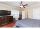 Bedroom featuring a dresser, tv, and ceiling fan at 111 S Delaware Ave # 1, Tampa, FL 33606