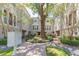 Attractive condos with mature landscaping, brick-paved courtyard, and multiple mailboxes at 111 S Delaware Ave # 1, Tampa, FL 33606