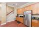 Bright kitchen featuring stainless steel appliances, dark granite counters, and hardwood floors at 111 S Delaware Ave # 1, Tampa, FL 33606