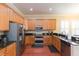 Spacious kitchen featuring stainless steel appliances, granite countertops, and ample cabinet space at 111 S Delaware Ave # 1, Tampa, FL 33606