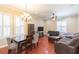 Spacious living room with natural light, hardwood floors, and modern furnishings at 111 S Delaware Ave # 1, Tampa, FL 33606
