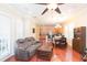 Comfortable living space with hardwood floors and an open floor plan to the kitchen at 111 S Delaware Ave # 1, Tampa, FL 33606