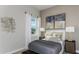 Cozy bedroom featuring a stylish bed, contemporary decor, and an inviting atmosphere at 11432 Shoreline Trl, Parrish, FL 34219