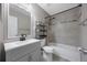 Updated bathroom features a shower-tub combination and a modern vanity at 12425 Touchton Dr # 77, Tampa, FL 33617